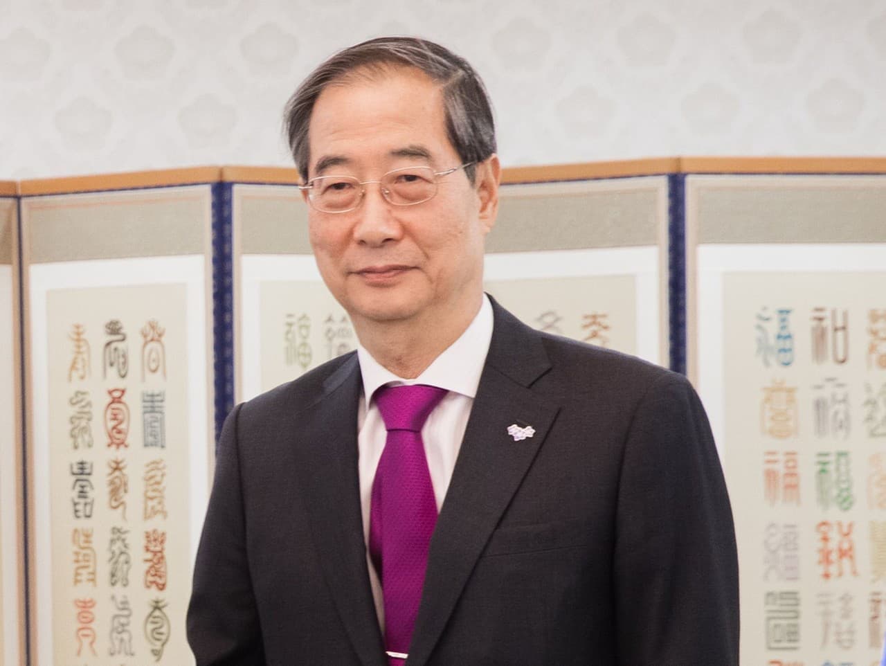 Expremiér Han Tok-su odsúdený na 23 rokov za vzburu v Soule